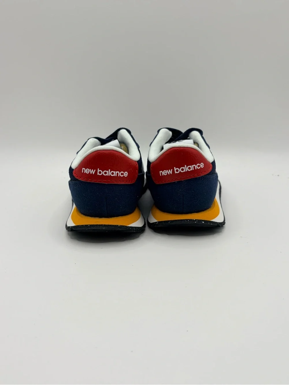 New Balance 237 Bungee Navy Kids Sneakers with White 'N' and Red Heel